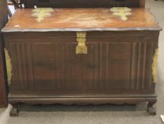 An African hardwood brass bound chest.