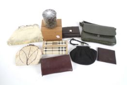 Assorted vintage ladies handbags and accessories.