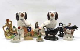 A collection of Staffordshire figures.