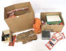 Two boxes of model railway accessories.