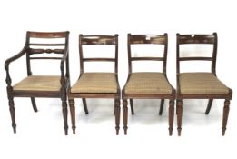 A set of four mahogany framed chairs.