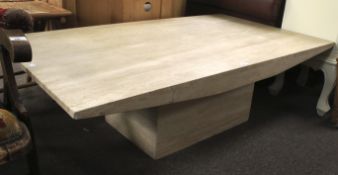 A large contemporary marble coffee table.