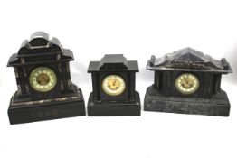 Three Victorian slate mantle clocks.