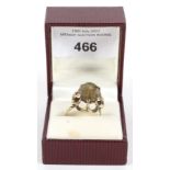 A 9ct gold ring.