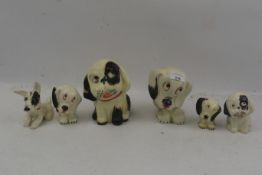 A collection of Crown Devon Bonzo ceramic figures of dogs.