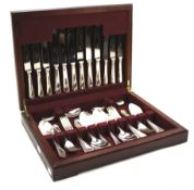 A stained wooden canteen of silver plated cutlery.