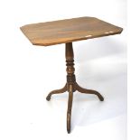 A mahogany occasional table.