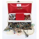 A jewellery box containing a selection of costume jewellery.