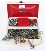 A jewellery box containing a selection of costume jewellery.