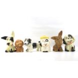 A collection of six assorted Crown Devon ceramic figures of dogs. Including Bonzo.