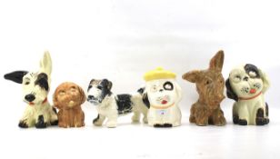 A collection of six assorted Crown Devon ceramic figures of dogs. Including Bonzo.