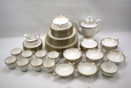 A Spode part tea and dinner service in the 'Golden Trellis' pattern.