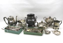 An assortment of silver plate and other metal wares.