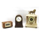 Three assorted mantel clocks.