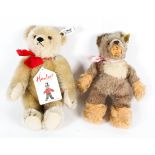 Two Steiff teddy bears.