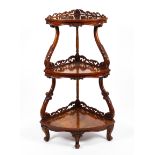 A Victorian three tiered burr walnut whatnot.