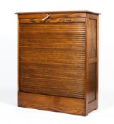 An early 20th century oak tambour cabinet.