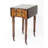 A Victorian mahogany drop leaf side table.