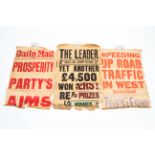 An assortment of early 20th century newspaper billboard posters.