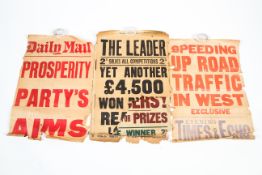 An assortment of early 20th century newspaper billboard posters.