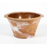 A 19th century terracotta and salt glazed twin handled dough bowl. diam.