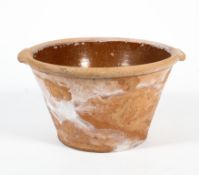 A 19th century terracotta and salt glazed twin handled dough bowl. diam.