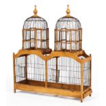 An early 20th century continental fruitwood chinoiserie shaped bird cage.