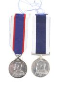 An Edward VII Royal Navy long service and Good Conduct medal and a George VI Volunteers medal.