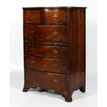 An early 20th century copy of a George II burr walnut serpentine fronted chest.