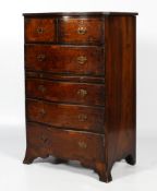 An early 20th century copy of a George II burr walnut serpentine fronted chest.