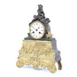 A French late 19th century gilt-metal striking mantel clock.