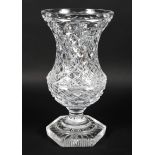 A large cut glass baluster vase.