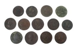 Thirteen half pennies: two 1694, 1719, 1744, 1751, 1773, 1775,