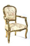 A giltwood Louis XV style armchair, late 19th/early 20th century.