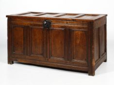 An early 19th century oak paneled coffer.