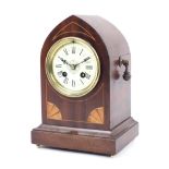 An Edwardian mahogany marquetry inlaid striking bracket clock.