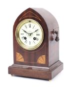 An Edwardian mahogany marquetry inlaid striking bracket clock.