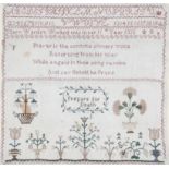 A 19th century needlework sampler.