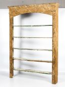 A 19th century stained and distressed free standing bookcase.