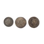 Three fourpence coins: 1731, 1686,