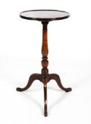 A 19th century mahogany converted dish topped wine table Raised on a turned column to a Georgian