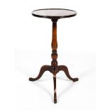 A 19th century mahogany converted dish topped wine table Raised on a turned column to a Georgian