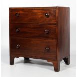 A Georgian mahogany chest of drawers.