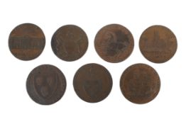 Seven 18th century half d tokens and one 19th century example