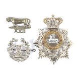 Three military badges.