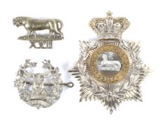 Three military badges.