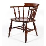 A 19th century elm smokers/captains chair.