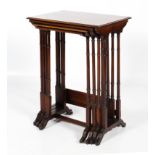 A nest of four Edwardian mahogany and cross banded "Quartteto" tables.