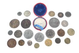 Twenty-three medallions and tokens including French 1896 silver medallion