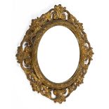 A fine gilt decorated circular wooden framed bevel edged wall mirror.